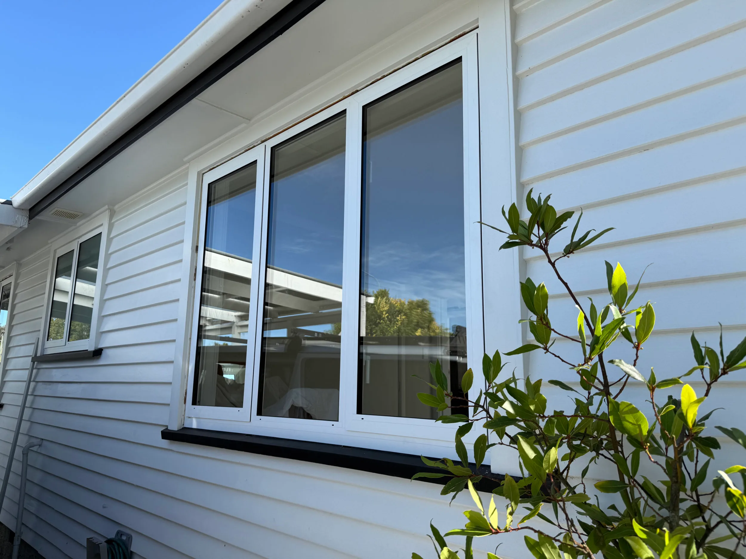 Thermally broken aluminium insert sashes fitted into the existing timber frames of a Christchurch character home